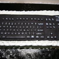 Computer Keyboard Cake This "Keyboard Cake" was paired with with an actual monitor with a slide show of bride and groom through the years. I found a...