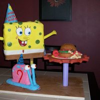 Spongebob And Gary W/ Krabby Patty This cake was for my nephews 6th birthday. My business partner and I made Spongebob and Gary with party hats on "giving" my...
