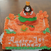 Pumpkin Princess Buttercream cake with fondant topper figures