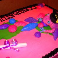 Graduation Cake red velvet, with cream cheese. Hand sculpted jewls and frog