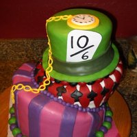Mad Hatter Themed Topsy Turvy Cake First topsy turvy cake, turned out ok structurally (pound cake FTW!) I didnt decorate as much as I was going to because I got tired of...