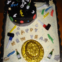 New Years 2011 My forst New Years cake made for my daughters house party. It would have been nicer if it was B/C, but she wanted cream cheese icing. Spice...