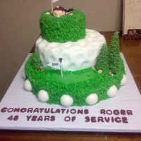 Retirement Cake Buttercream, Marshmallow Fondant golf ball & golfer on top, white chocolate golfballs on bottom.