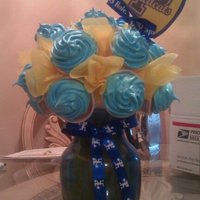 Peidmont Cheer Squad Cupcake Bouquet smore cupcakes, so i used cups, normally i just use toothpicks, glued the cups to the ball, and then double lined the cupcakes and stuck...