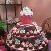 Luau Cupcakes With Giant Cupcake Topper for my daughters 13th birthday, 3 dozen smore and cookies and cream cupcakes, with a giant samoa cupcake topper!