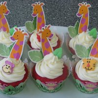 Jungle Themed Cupcakes These cupcake went along with the Diego cake. They are red velvet cupcakes with cream cheese frosting. All accents were from Wilton's...