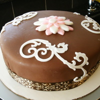 My First Cake - Banana Cake With Cream Cheese Icing And Chocolate Fondant I haven't taken any cake classes, but I really do love custom cakes and my husband challenged me to start making my own instead of...