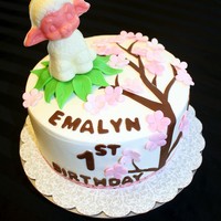 Spring Lamb Cherry Blossom Cake The Lamb I made out of chocolate and a 3D mold. The base of the cake is buttercream and the rest of the decorations is made out of fondant...