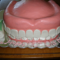 Denture Cake With Poli-Grip I made this cake for my step dad's over the hill birthday party. I covered it with home made marshmallow fondant and the poli-grip...