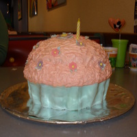 Giant Cupcake I free hand shaped this giant cupcake and covered the bottom portion with home made marshmallow fondant to look like a wrapper, and butter...