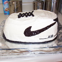 Nike Air Force 1 This was my first ever shaped cake. I used cool whip and piping gel for the details. It was for my boyfriends 30th (he's into sneakers...