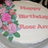 Birthday Cake First gum paste flowers. This is an ice cream cake with gum paste flowers. Lettering was cut with an electronic die cut machine, the...