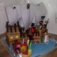 Pirate Ship I made this cake for my son's birthday. This entire cake was edible apart from some little figures that i put on it and the skull &amp...