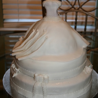 Dress Cake 1st tier dress was yellow cake and fondant, 2nd tier was red velvet w/ cream chesse frosting, 3rd tier was yellow cake w/ choc frosting and...