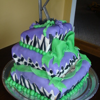 Crazy Animal! Attempt at a topsy turvy cake. Vanilla with buttercream and marshmallow fondant.