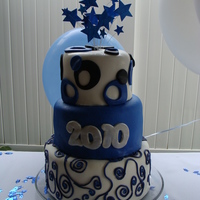 High School Graduation Cake Vanilla cake, vanilla buttercream frosting and marshmallow fondant.