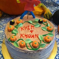 A Pumpkin Patch B-Day Cake Marshmallow Buttercream and Blackout chocolate cake with fondant figures