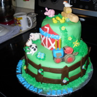 Farm Boy Birthday Cake made for a 2 year old. Had a blast making these animals. Found tutorials on utube and ideas from cake central. Used piping gel for the pond...