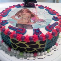 Hannah Montana Birthday Cake One of the very first birthday cakes that I've done. Used edible tattoos by Duff and buttercream icing.