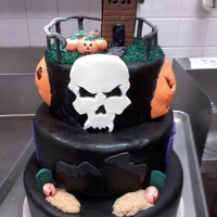 Halloween Class Project Practice cake made in Advanced Patisserie in school. It was a group project with me and another partner. I did the top haunted house.