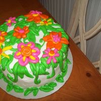 Spring Cake Inspired by Bronwen Webers flower basket cake. I wanted to try these types of fondant flowers. Still working on techniques!