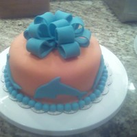Miami Dolphins Cake This was the first cake I made; it was for class. It was football season, so I was inspired to make a cake of my favorite team. I took the...