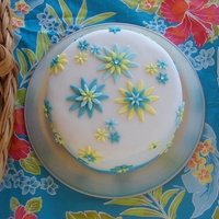 Flower Birthday Cake A MMF covered birthday cake, flowers cut with flower cutters.