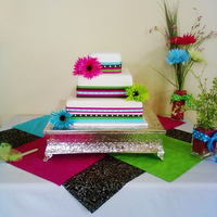 Spring Wedding Cake Carrot cake with cream cheese frosting, covered in marshmallow fondant.