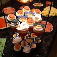 A Spooky Caketacular Extravaganza These 24 mini cakes collectively made up one spooky display of ghoulish party favors on Halloween eve. Each cake is topped with homemade...