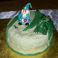 Dragon & Wizard This was a last minute...middle of the night cake. It was a two layer marble fudge cake with butter cream frosting and Homemade Fondant...