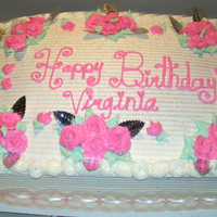 Pastel Pink Roses With Lace & Sugar Glitter This cake was a 2 layer Combed Full Sheet Marble Cake with Buttercream Frosting Roses & Leaves. The Antique Lace was Carefully Boiled...