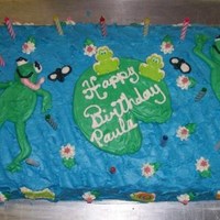 One Layer Frog Cake With Sugar "bugs" This was a full size 1 layer Marble Cake with Tinted Buttercream Frosting. I also used some Store Bought Sugar Bugs along the sides.
