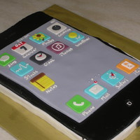 Iphone 4 Cake This is a ganache chocolate butter cake decorated with fondant.