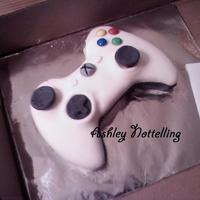 Xbox this is the first cake i had ever made for my bf who loves to play his xbox 360.for a guide i had to sneak his controller to my grandmas...