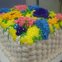 Basket Weave first try at a basket weave cake... first time for all the flowers too... i was youtubing all the techniques.... love youtube....lol