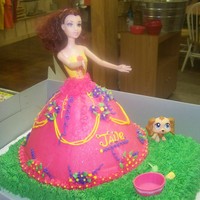 Second Doll Cake With Whole Doll this is my second cake and i used a doll i wrapped her in plastic wrap she was taller than i thought but i worked it out... little girl...