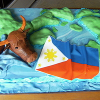 Welcome Home This cake was for a friends son who returned from his mission from the Philippine Islands. They asked for three things. The islands he...
