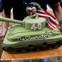 Military Tank Thanks to my husband for standing outside for a moment on his way to deliver this cake so I could take a picture. I didn't use the...