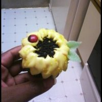 Sunflowers red velvet sunflower cupcakes made with oreos and cream cheese frosting. i used hershey's dark chocolate pieces and edible marker for...