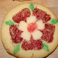 Tudor Cookies Sugar cookies using Tudor Rose templates (that I made) for a friend who plays a Noble at the Renaissance Faire. Used edible red glitter and...