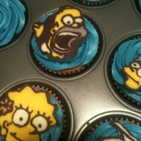 Simpsons Cupcakes Chocolate transfers of Simpsons characters for my boyfriend's 26th birthday. These are gluten free carrot cake with maple cream cheese...