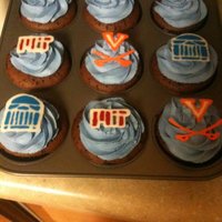 Mit And Uva Cupcakes Chocolate cupcakes filled with chocolate peanut butter ganache and topped with buttercream and chocolate transfers. These were made for the...
