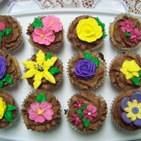 ~Course 2 Flowers And Cake Design/lesson 1, 3~ Purple and yellow is fondant/gum paste - the others are royal icing - buttercream frosting. Happy decorating!