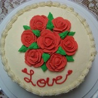 Buttercream Frosting W/royal Icing Flowers Just finished the Wilton's Flowers and Cake Design Course - I made a basketweave in the 4th week of class, this is the 1st my first...