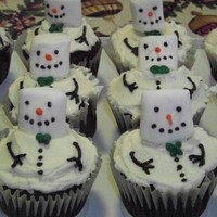 Cupcakes Melting Snowmen - made these for Christmas Eve gathering with family. Big hit! Idea found here on CC, thanks.