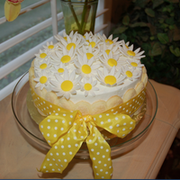 Don't Eat The Daisies! Nah, Go Ahead! Easter cake made with fondant daisies. Lemon cake with lemon filling and a layer of mascarpone cheese and whipped cream, flavored with...