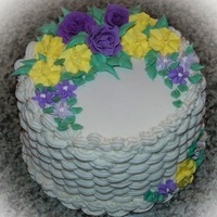 Lynda's Birthday Cake My 2nd basket weave cake and first attempt at fondant roses and royal icing flowers....white cake with raspberry fruit layer and Chambord...