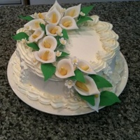 Calla Lilies Birthday Cake Lemon Cake with Lemon filling and whipped cream flavored with lemoncello. Frosted with Frosting Pride. Gumpaste Calla Lilies from Edna De...
