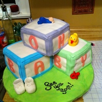 Baby Shower Cake Devils Food Cake with coffee buttercream filling. used 3 6" squares for each block-- all covered in fondant with fondant accents,...