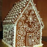 Simple Gingerbread House This was my first time doing this. I wanted to keep it very classic and elegant and I didn't have any candy to decorate with! Lots of...
